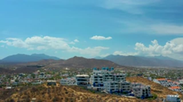 LOS CABOS MEXICO-2020: City On Top Of A Mountain Showing Mountains In The Distance