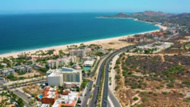 LOS CABOS MEXICO-2020: The Pleasant View Of The Blue Sea And Beach City Roads