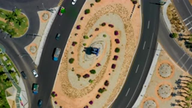 LOS CABOS MEXICO-2020: Sky View Of Cars Traveling On A Roundabout In The Middle