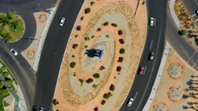 LOS CABOS MEXICO-2020: Sky View Shot Of Cars Driving On The Roundabout In The