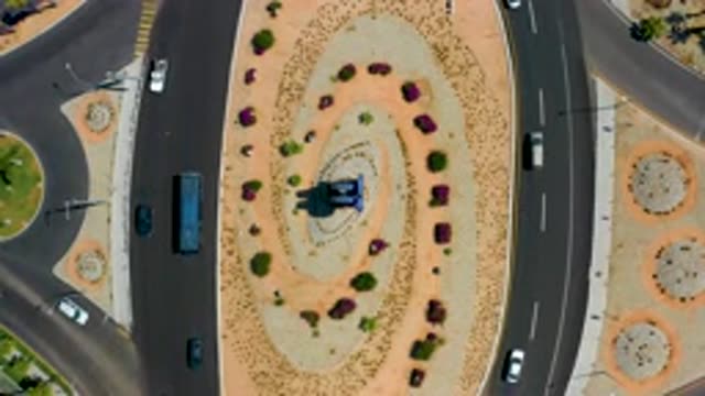 LOS CABOS MEXICO-2020: Populated Road With Traffic Driving Around A Roundabout