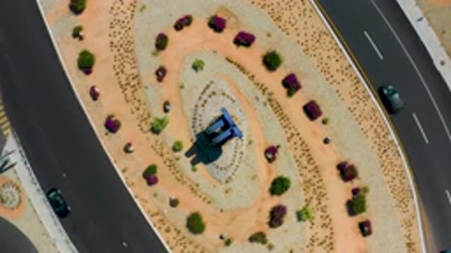 LOS CABOS MEXICO-2020: Cars Turning Around A Roundabout