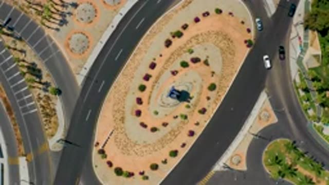 LOS CABOS MEXICO-2020: Sky View Of Cars Driving On A Roundabout In The Middle Of