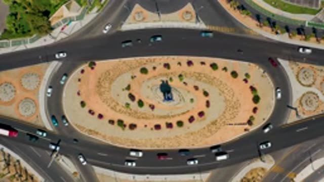 LOS CABOS MEXICO-2020: Sky View Of Cars Traveling On A Roundabout In The Middle