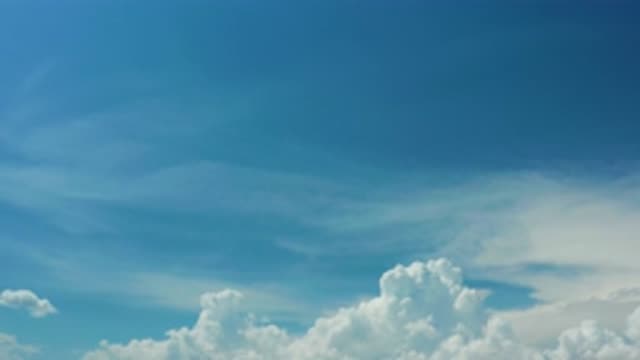 LOS CABOS MEXICO-2020: White Fluffy Clouds Rolling in a Blue Sky