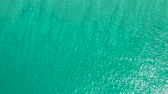 LOS CABOS MEXICO-2020: Top View of the Silent Blue Sea with Gentle Waves