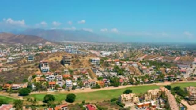 LOS CABOS MEXICO-2020: Old World Elevation Green Grass Blue Sky Colorful Towns