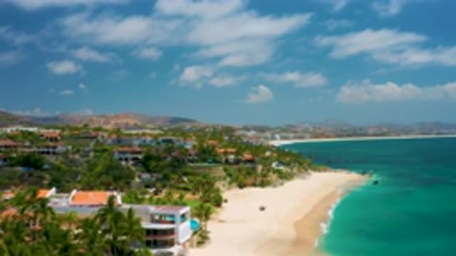 PALMILLA BEACH CABO MEXICO-2020: Aerial Footage Of A Long Sandy Shoreline With