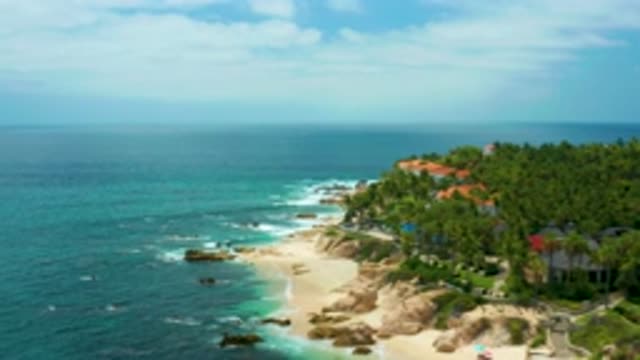 PALMILLA BEACH CABO MEXICO-2020: Gentle Ocean Waves Coming Onto A Sandy Beach