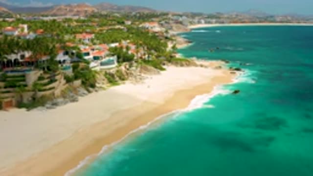 PALMILLA BEACH CABO MEXICO-2020: Crystal Blue Green Water Waves Rolling On Beach
