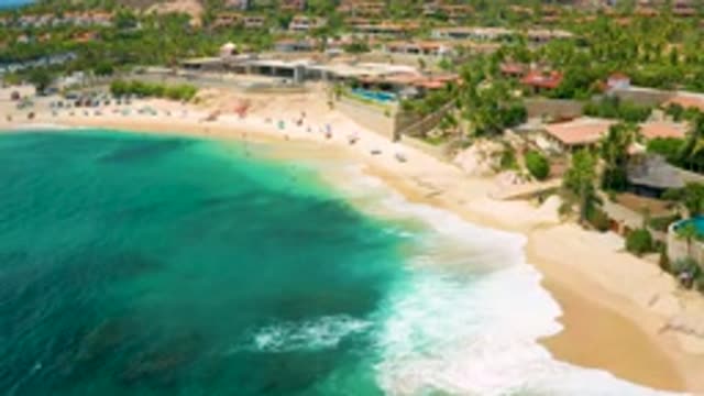PALMILLA BEACH CABO MEXICO-2020: Aerial Footage Of The Blue Ocean Shoreline And