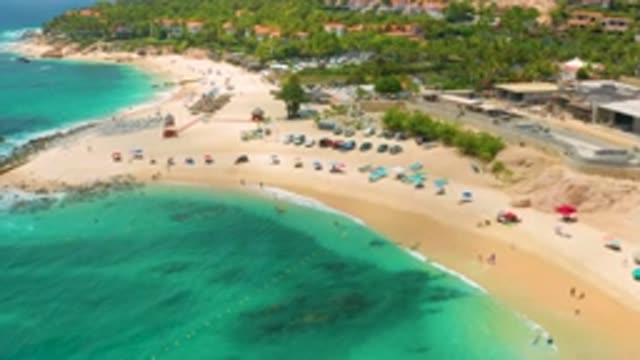 PALMILLA BEACH CABO MEXICO-2020: Sunny Day On The Beach Where People Are Enjoying The Waves