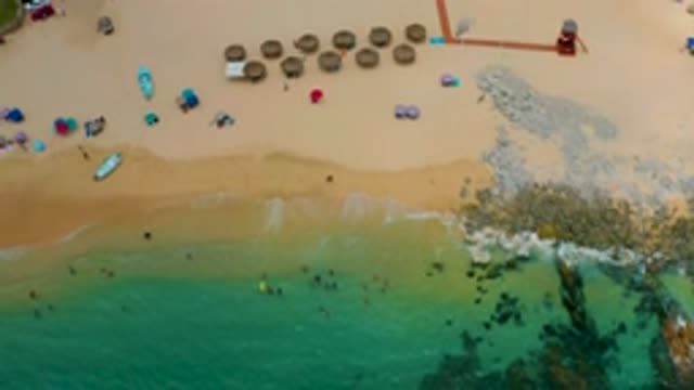 PALMILLA BEACH CABO MEXICO-2020: Beachfront With Umbrellas And People Walking On