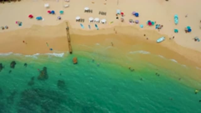 PALMILLA BEACH CABO MEXICO-2020: Aerial View Of Busy Sandy Beach With People