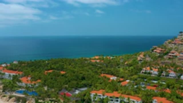 PALMILLA BEACH CABO MEXICO-2020: Aerial View Of Hillside Resort Green Trees With Ocean