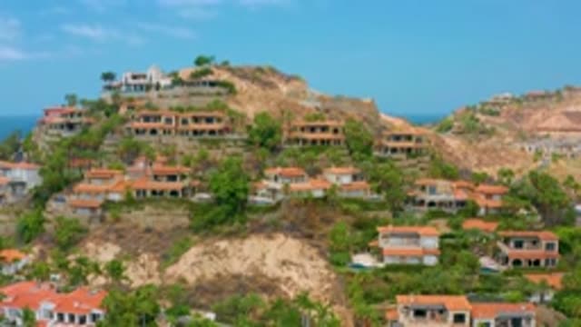 PALMILLA BEACH CABO MEXICO-2020: Greek Village On Rocky Cliffs