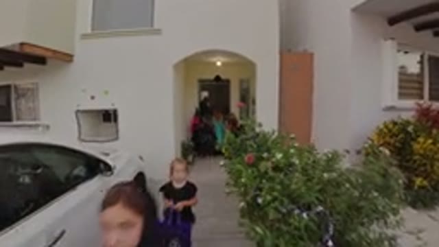 LOS CABOS MEXICO-2019: Kids All Dressed In Halloween Costumes Go Trick Or Treating