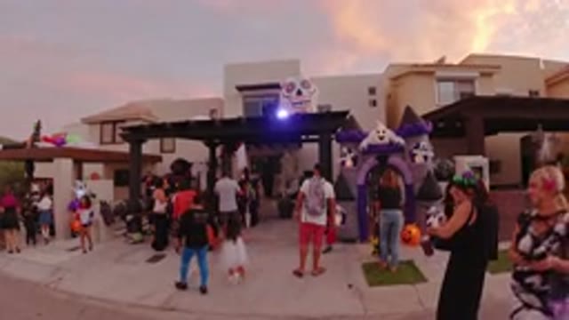 LOS CABOS MEXICO-2019: Halloween Haunted House Greets Child at Sunset