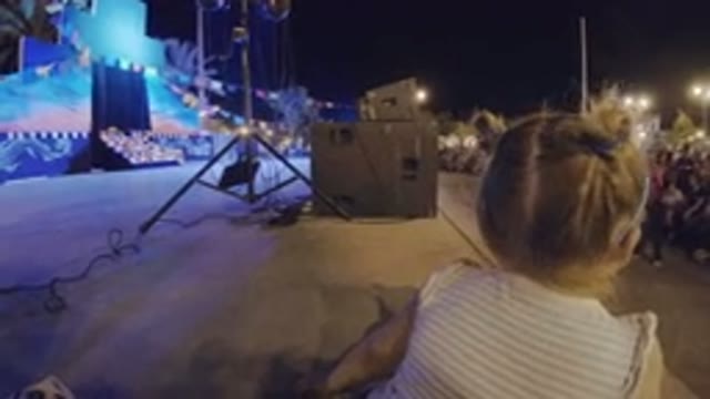 LOS CABOS MEXICO-2019: A Fancy Girl Sitting At The Side Of Stage In Front Of