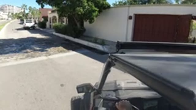 LOS CABOS MEXICO-2019: Footage Of Car Driving Down Slowly A Residential Street