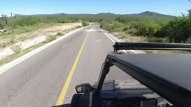 LOS CABOS MEXICO-2019: Jeep With Light Bar On Winding Steep Descent Road On A