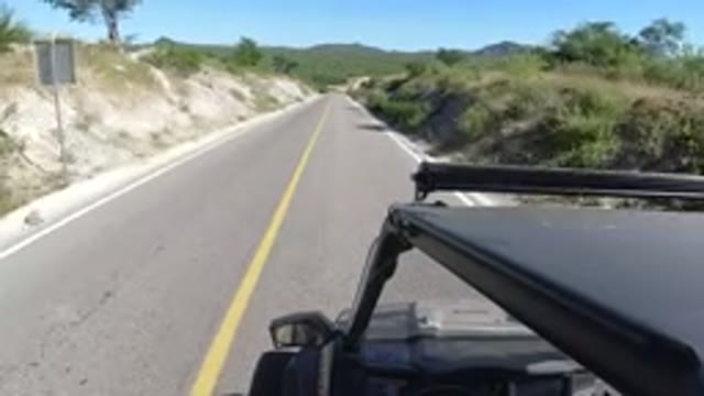 LOS CABOS MEXICO-2019: Car Driving Smoothly On The Road