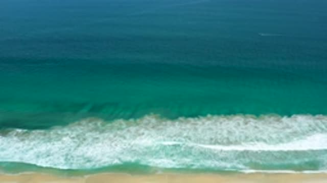SAN JOSE DEL CABO MEXICO-2020: Serene Seaside Waves and Sandy Beach
