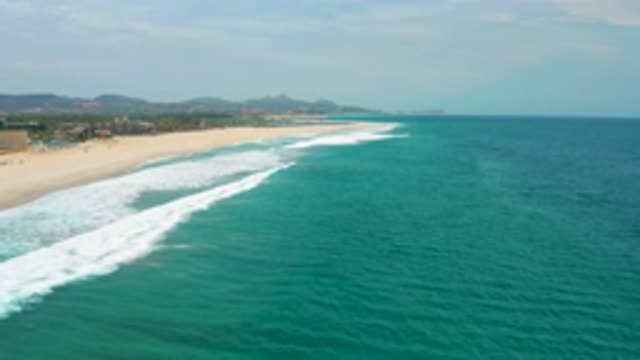 SAN JOSE DEL CABO MEXICO-2020: Clear Skies Following A Shoreline And Waves