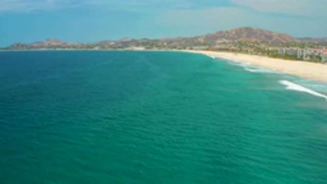 SAN JOSE DEL CABO MEXICO-2020: Big Blue Clear Sea With Long Beach Soft Sand