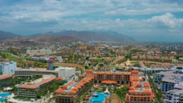 SAN JOSE DEL CABO MEXICO-2020: White Clouds Hover Over Mountains Behind