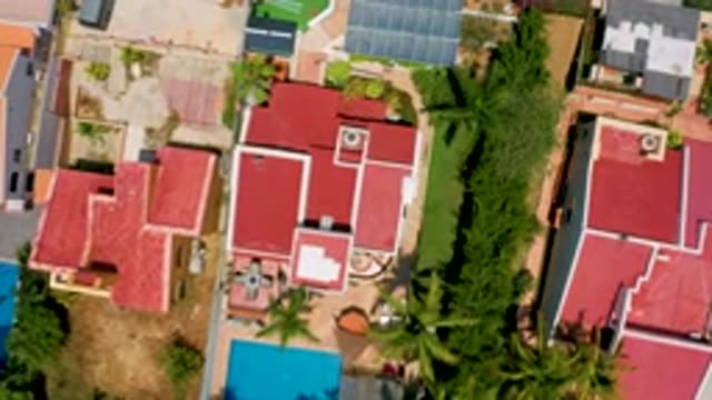 SAN JOSE DEL CABO MEXICO-2020: Aerial View Of Houses With Roofs And Pool