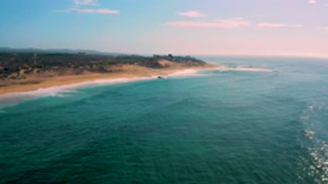 SHIPWRECKS BEACH BCS MEXICO-2020: Coastal View Of Sandy Beach With Surrounding Cliffs And Hills