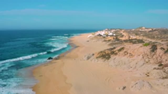 SHIPWRECKS BEACH BCS MEXICO-2020: Blue Waves Wash Against Sandy Shore Filled