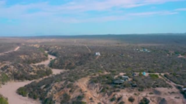 SHIPWRECKS BEACH BCS MEXICO-2020: View Of Sand Dunes Under A Blue And Pink Sky