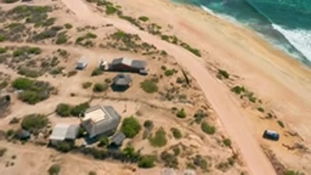 SHIPWRECKS BEACH BCS MEXICO-2020: Houses Located Green Trees Around It And Long