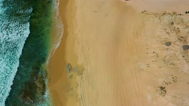 SHIPWRECKS BEACH BCS MEXICO-2020: Waves Gently Lashing The Sandy Shores Of A