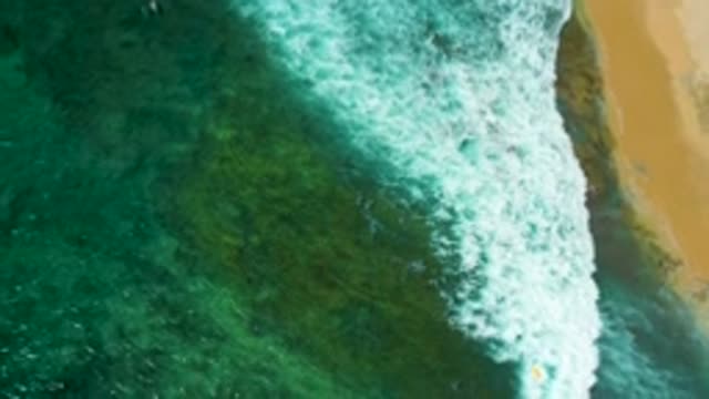 SHIPWRECKS BEACH BCS MEXICO-2020: Camera Pans As Green-Blue Waves Filled With