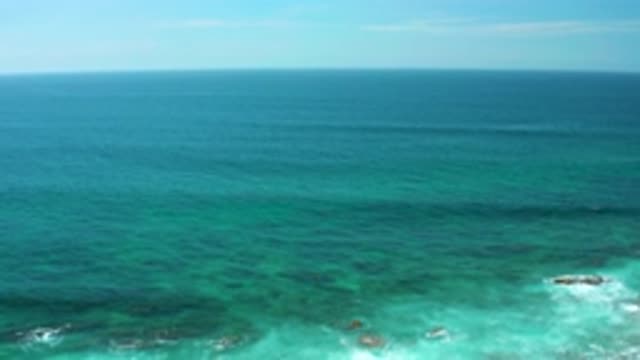 SHIPWRECKS BEACH BCS MEXICO-2020: Slow Pan Over Rocky Coastline Waters