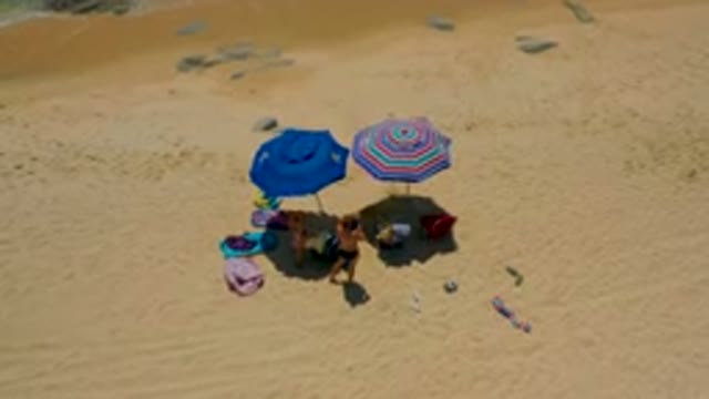 SHIPWRECKS BEACH BAJA CALIFORNIA SUR MEXICO-2020: Aerial View of Beachgoers Under Umbrellas