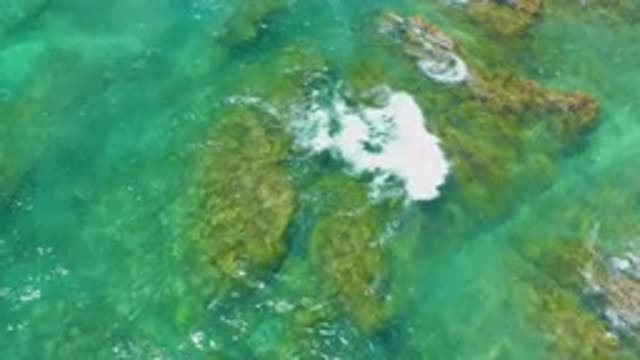 SHIPWRECKS BEACH BCS MEXICO-2020: Green-Blue Water Crashes Over Ocean Rocks