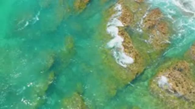 SHIPWRECKS BEACH BCS MEXICO-2020: Aerial Footage Of Water Crashing Along A Rocky Shoreline