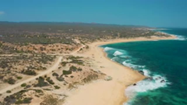 SHIPWRECKS BEACH BCS MEXICO-2020: Deep Blue Water Crashes Upon Sandy Shore Under