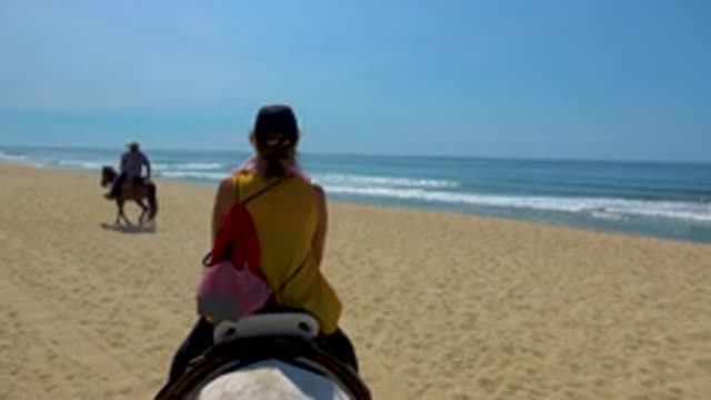 SAN JOSE DEL CABO MEXICO-2020: A Lady With Short Hair Riding A Horse