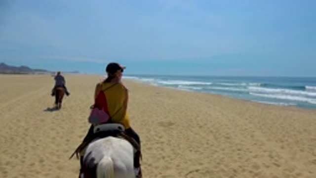 SAN JOSE DEL CABO MEXICO-2020: Horseback Riding Along A Lovely Beach As The