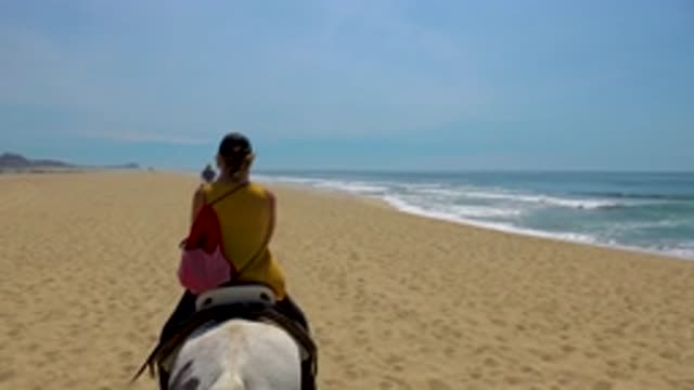 SAN JOSE DEL CABO MEXICO-2020: Bareback Horse Riding Along A Breathtaking Sandy Shoreline
