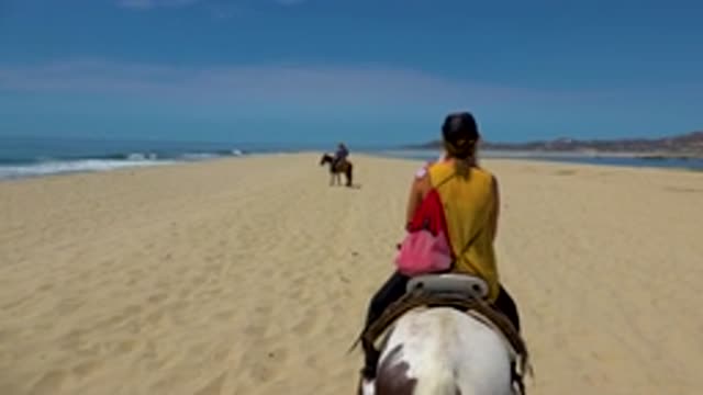 SAN JOSE DEL CABO MEXICO-2020: Lady Riding Horse With Short Hair