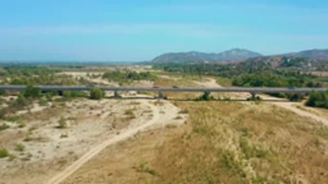 SAN JOSE DEL CABO MEXICO-2020: Cars Using Man-Made Bridge To Cross The Vast
