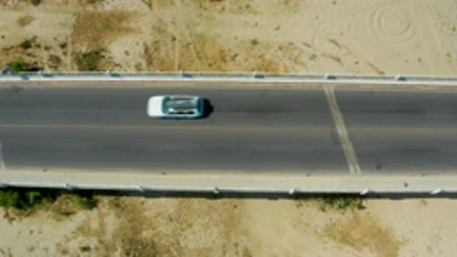 SAN JOSE DEL CABO MEXICO-2020: One Single Car Drives On A Two Lane-Only Road In