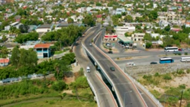 SAN JOSE DEL CABO MEXICO-2020: Aerial View Of City With Cars In Mobility And