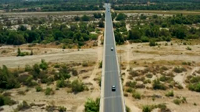 SAN JOSE DEL CABO MEXICO-2020: Car Moving On Road Both Side Of Road Are Field